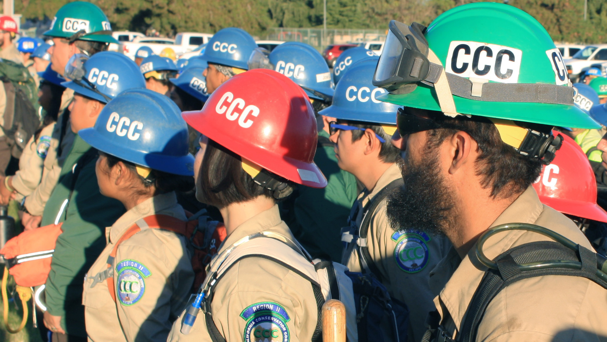 Video (1) A group of recruits wearing CCC hardhats stand in lines.