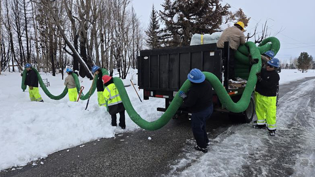 Corpsmembers install compost socks and waddles to protect the watshed.